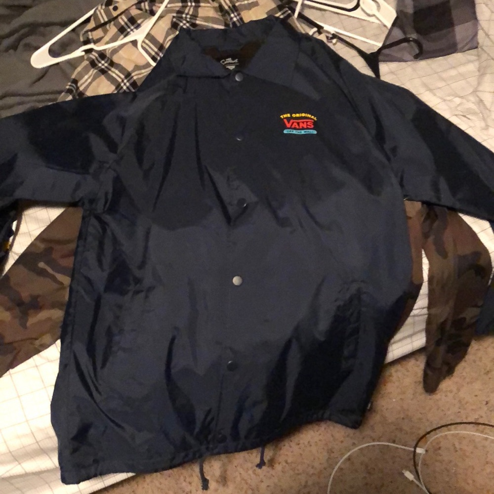 Brand new never worn blue simpsons windbreaker